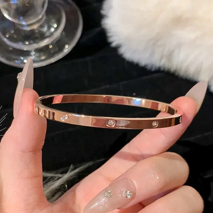 Zircon Titanium Rose Gold Bangles